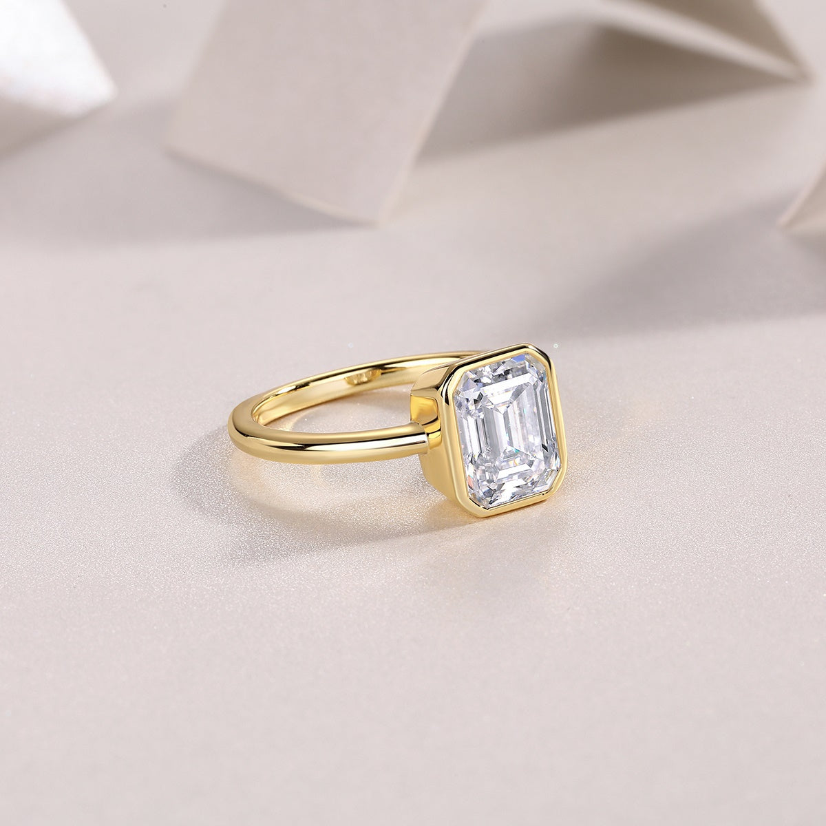 An octagonal 7*9 Moissanite S925 sterling silver and gold-plated eco-friendly diamond ring
