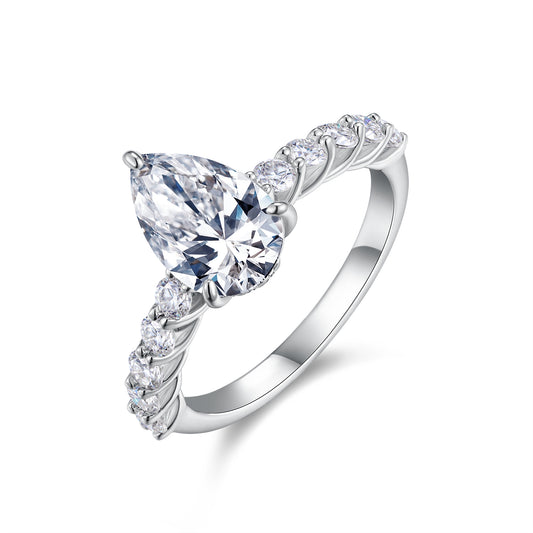 An eco-friendly diamond ring set with pear-shaped Moissanite S925 sterling silver plated with platinum